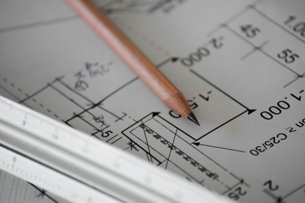 Building plans with a pencil and a ruler